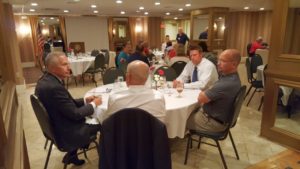 Discussing the heavy topic covered in today's rotary meeting.