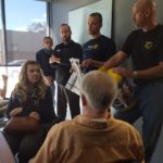 The Marquette West Rotary learns about Pennies for Polio.
