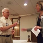 The passing of the gavel to President Elect, Amanda Filizetti.