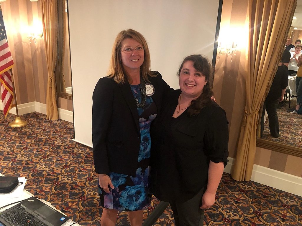 Marquette West Rotary President Lucy Grove with new member Brooke Quinn.