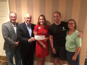 The YMCA of Marquette County receiving their $600 grant.