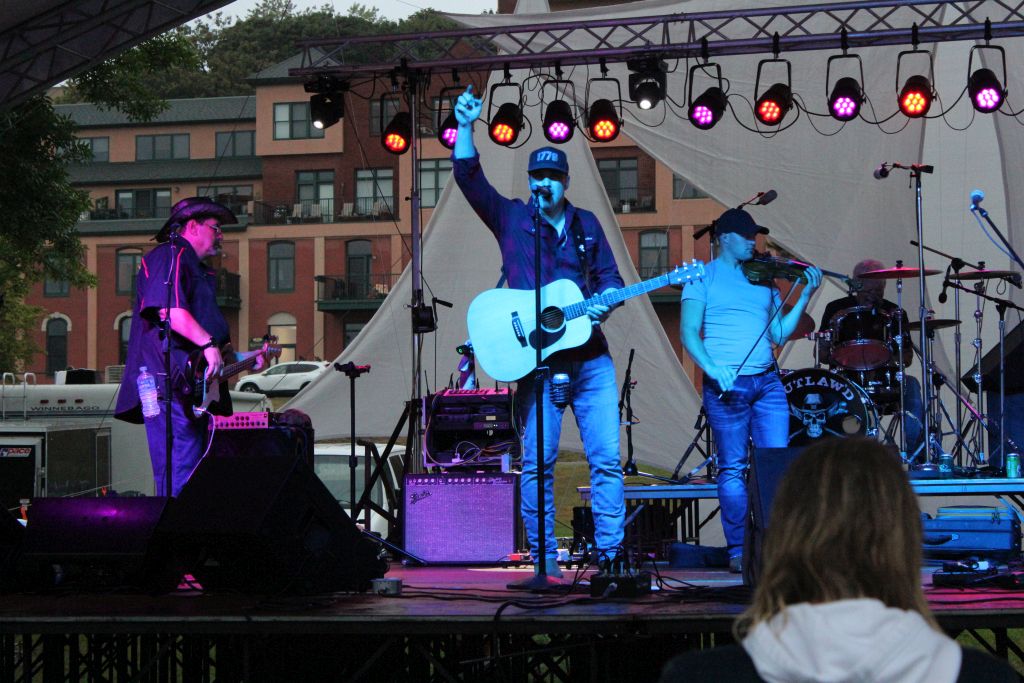 Lead Singer of Outlaw'd hyping up the crowd